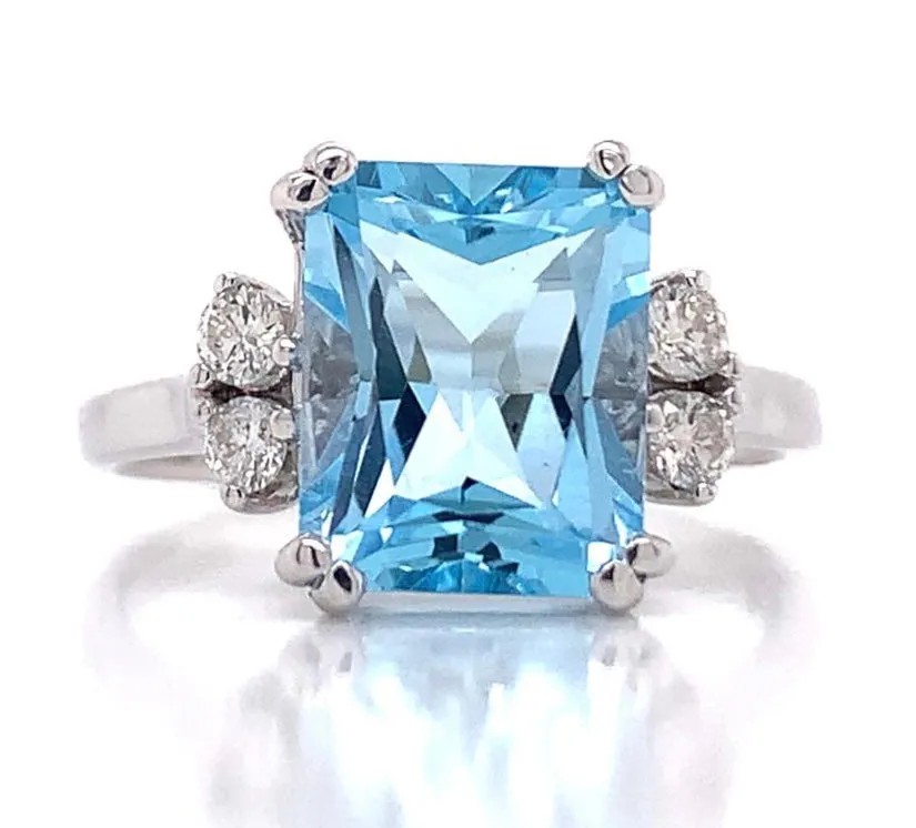 3CT SKY BLUE TOPAZ .16CT DIAMOND WHITE GOLD RING