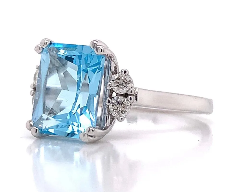 3CT SKY BLUE TOPAZ .16CT DIAMOND WHITE GOLD RING