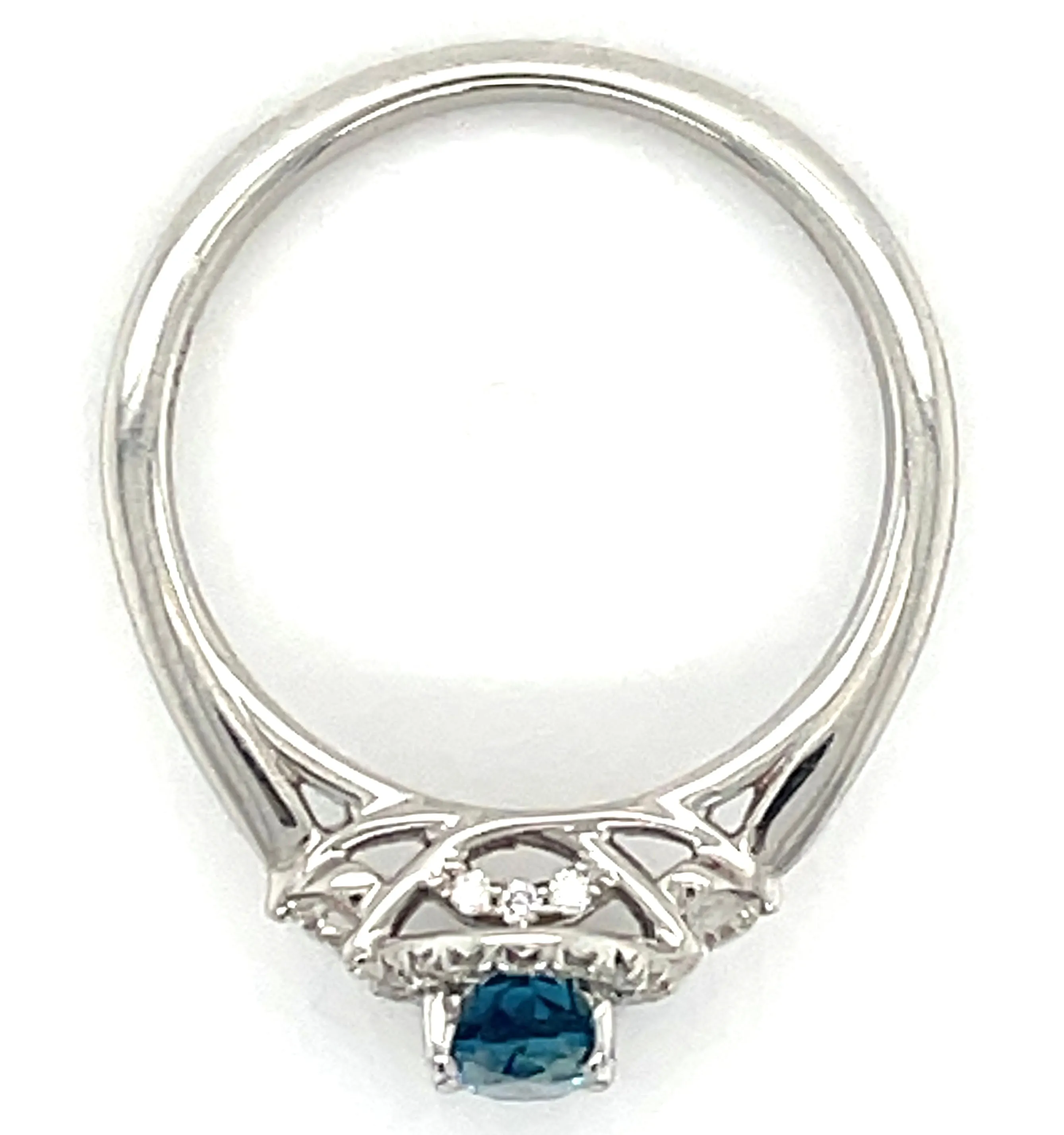 9ct White Gold Earth Grown 0.57ct London Blue topaz and 0.21ct Diamond Halo Ring