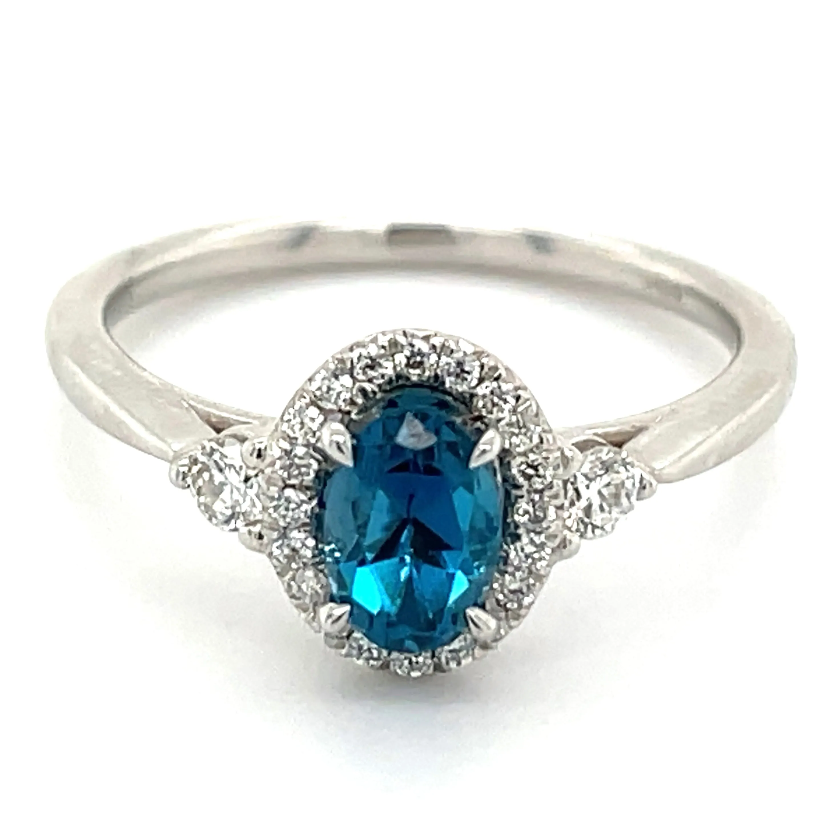 9ct White Gold Earth Grown 0.57ct London Blue topaz and 0.21ct Diamond Halo Ring